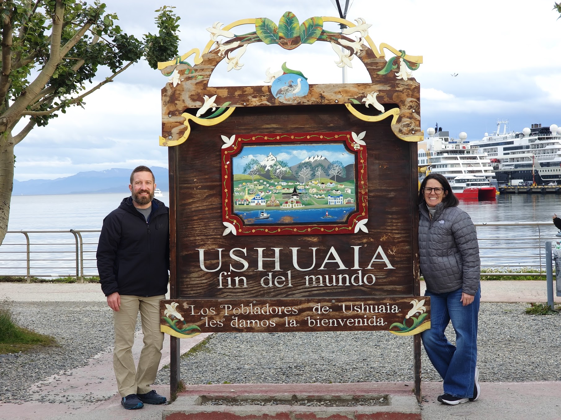 Brian and Jennifer Schwan at the Ushuaia fin del mundo sign in Tierra del Fuego, Argentina