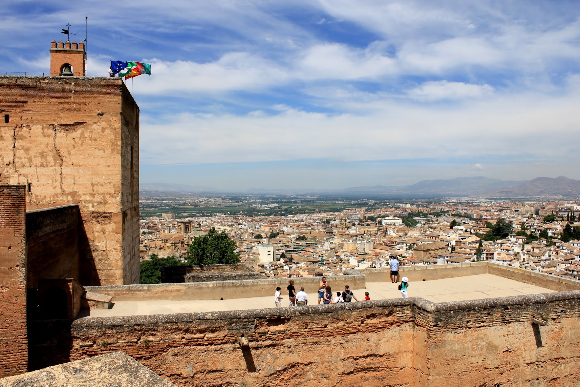 The view from the walls of the Alhambra fortress looking out over the city of Granada and the surrounding hills